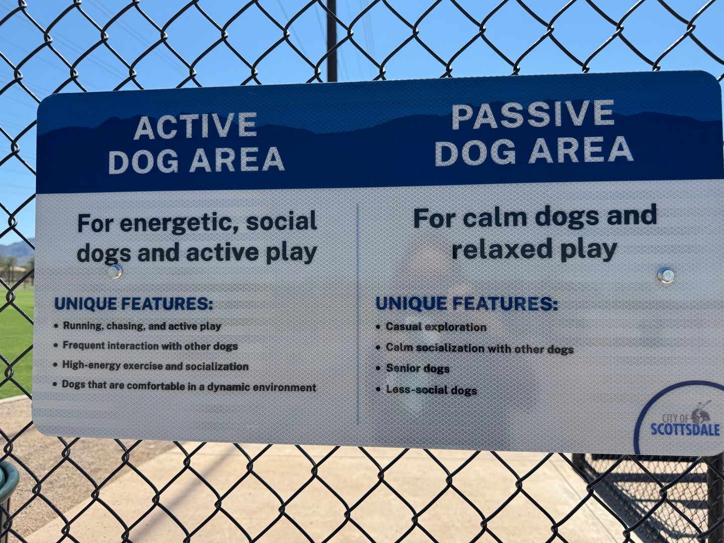 The posted Active Dog Area and Passive Dog Area sign at Thompson Peak Dog Park in Scottsdale, showing the temperament-based split for each cell.
